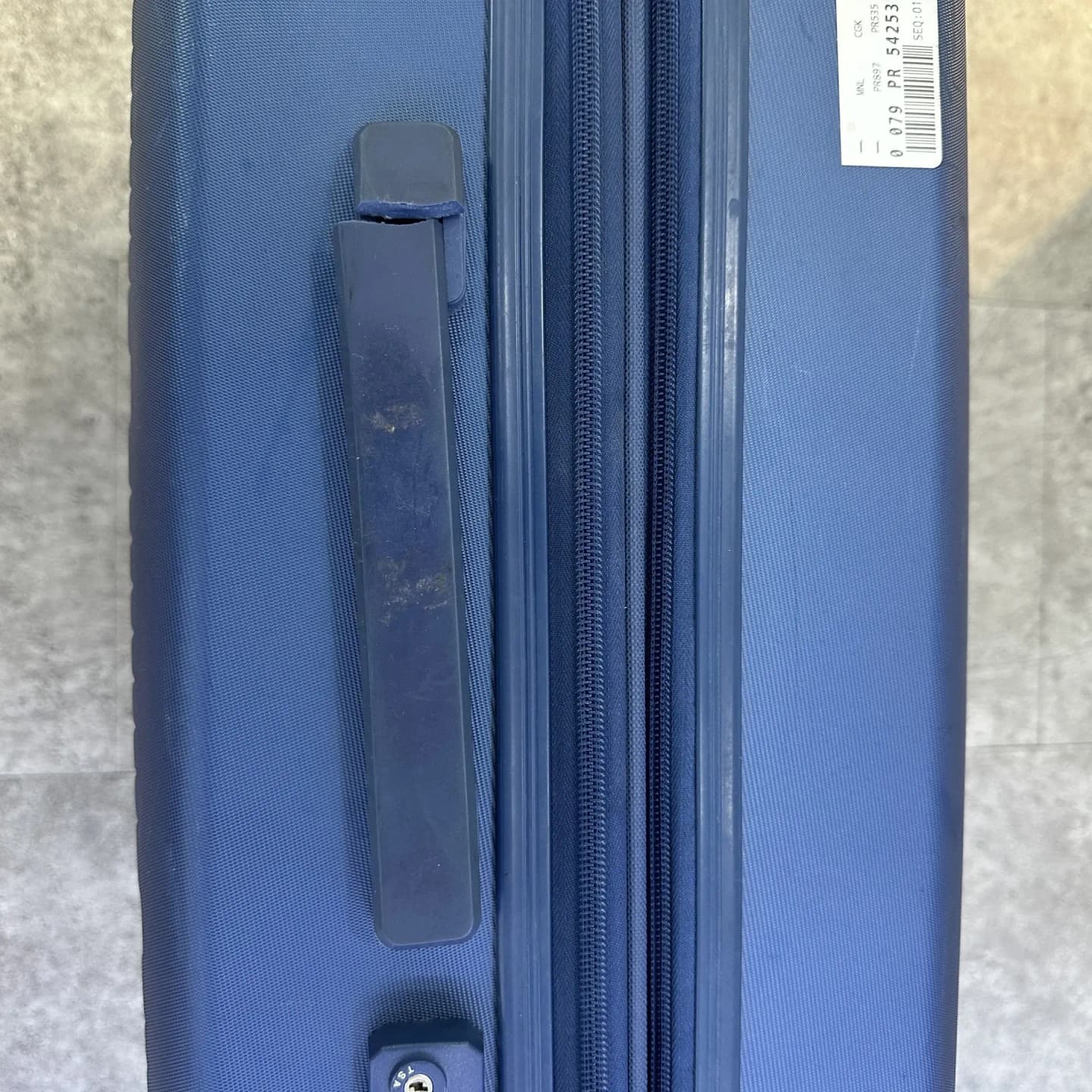 luggage-handle before